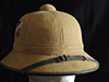Army tropical sun helmet with tan cotton drill cover over cork
